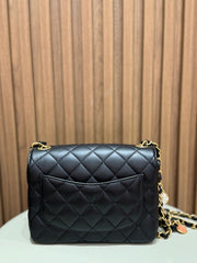 MINI FLAP WITH CHARMS