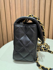 MINI FLAP WITH CHARMS