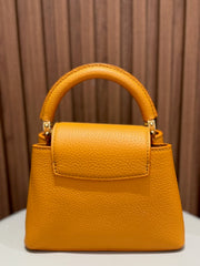 LV CAPUCINES MINI OCRE