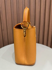 LV CAPUCINES MINI OCRE